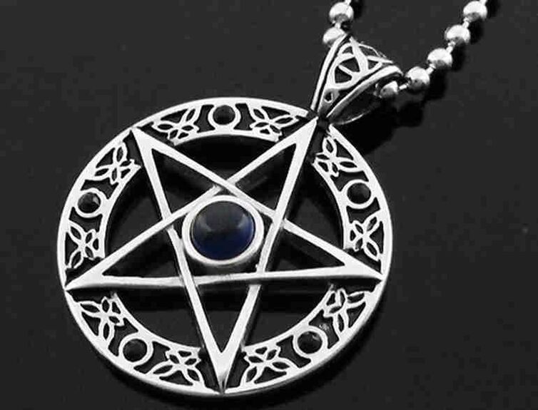 A magic pendant as an amulet of success